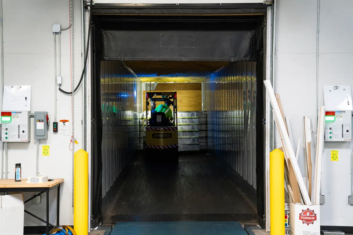Forklift receiving component shipments at an industrial loading dock