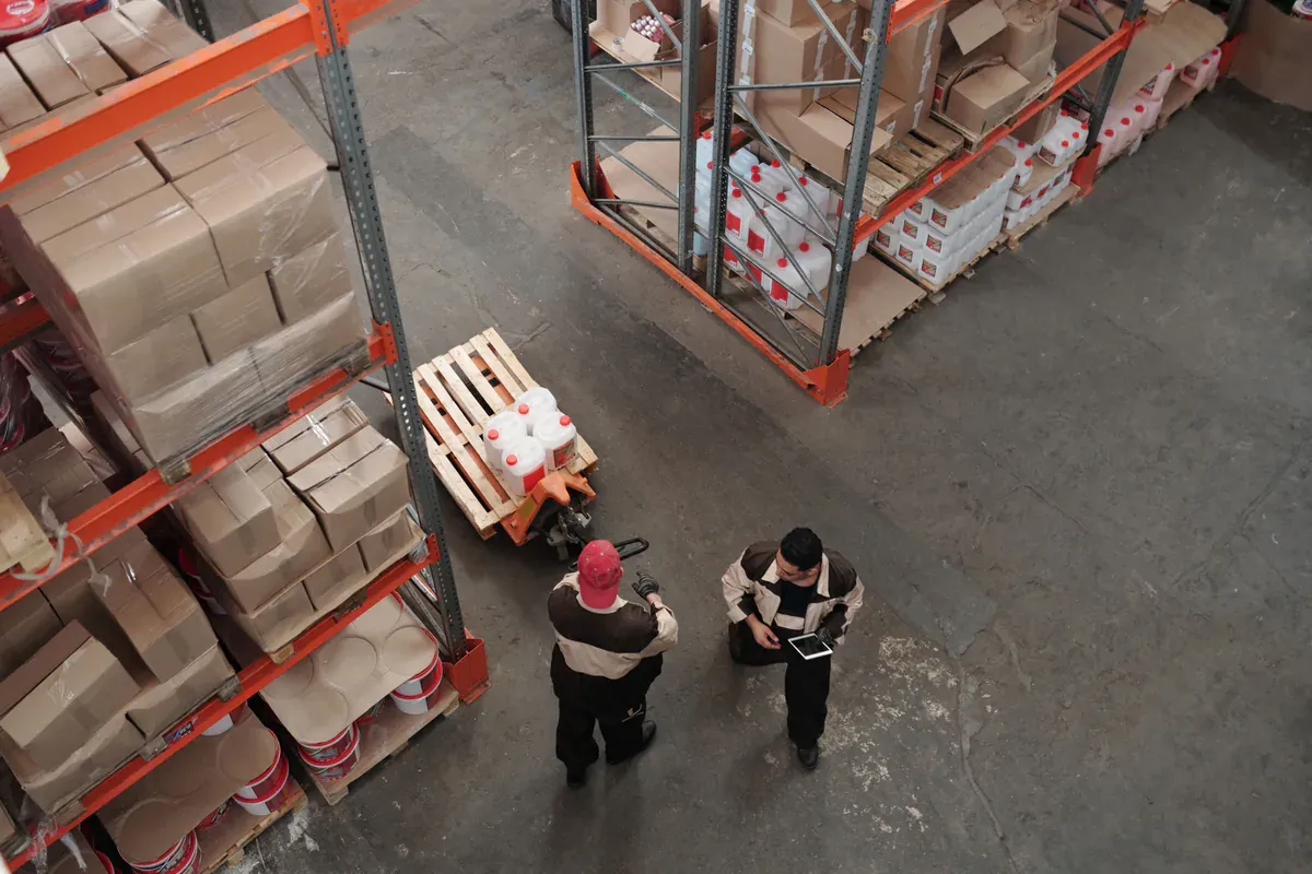 Warehouse team checking inventory during a production shortage
