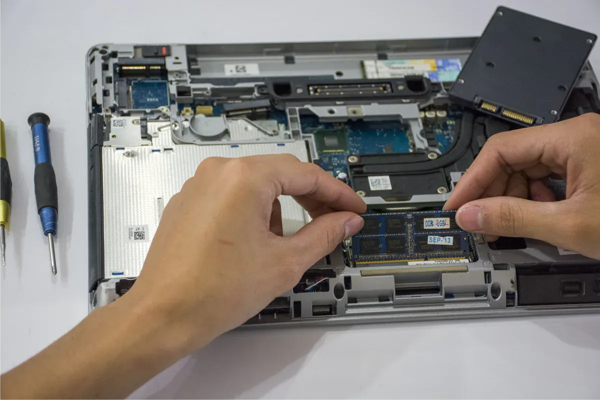 Laptop motherboard power-delivery area with inductors and controller components