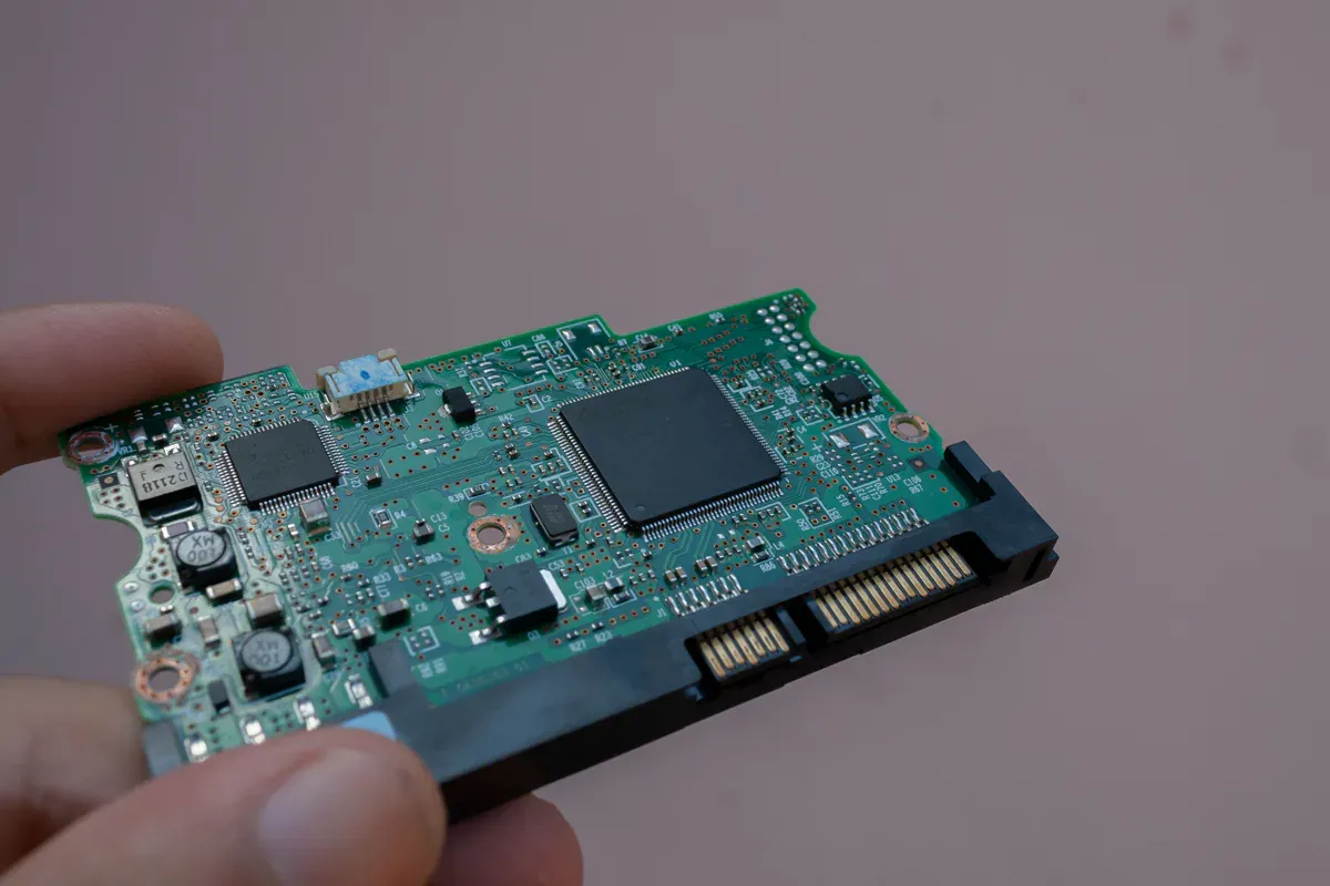 Plastic packaged integrated circuit shown on a populated circuit board