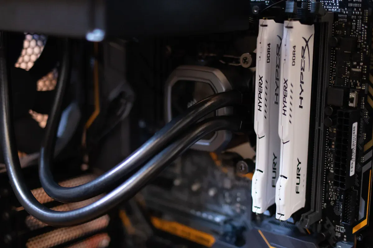 Computer memory installed beside other components in a working system