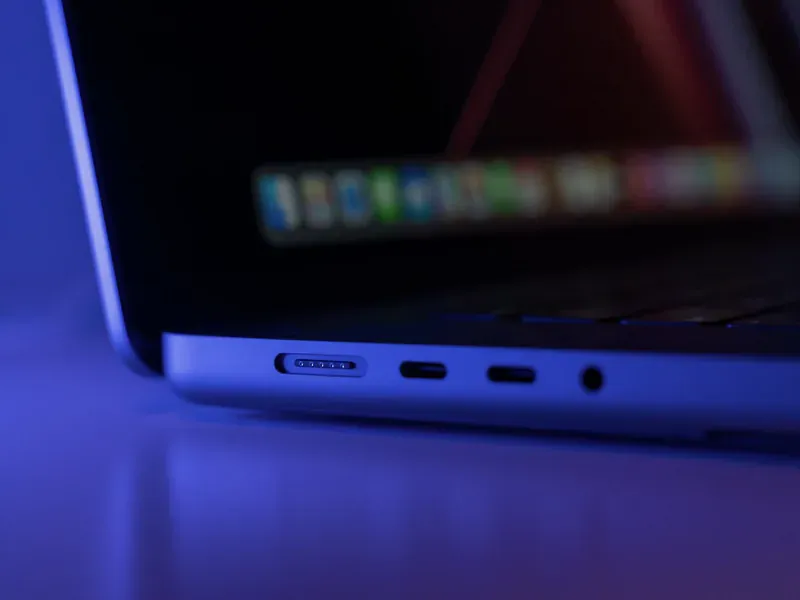 Laptop and mobile device charging over USB-C illustrating port-role and power-contract decisions