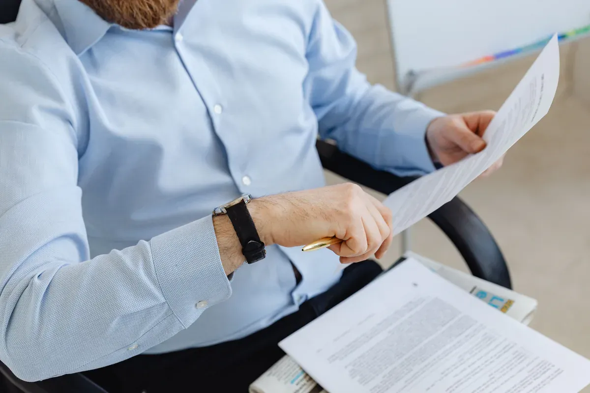 Quality specialist reviewing certificates and controlled records