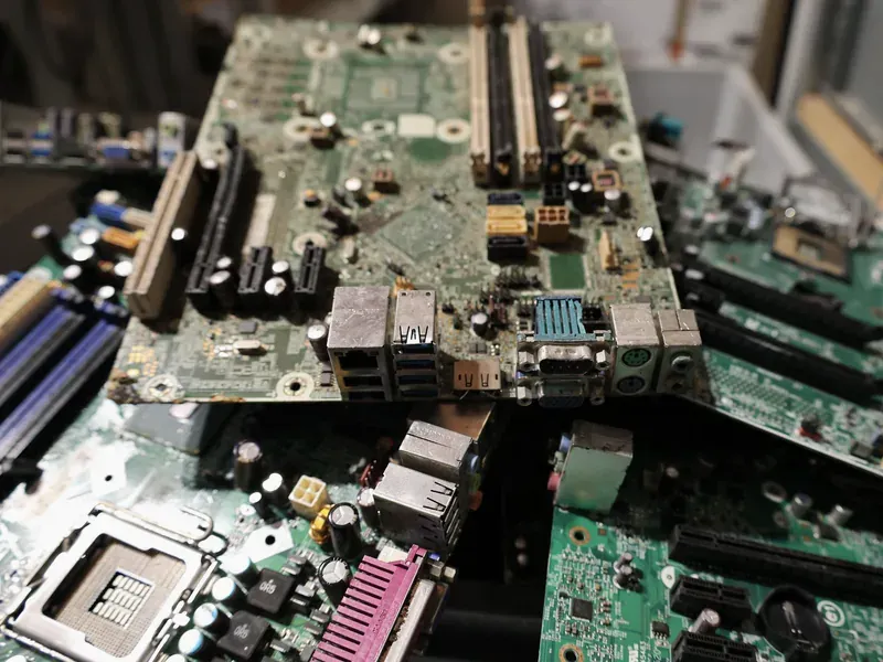 Circuit boards being sorted at an electronics recycling facility