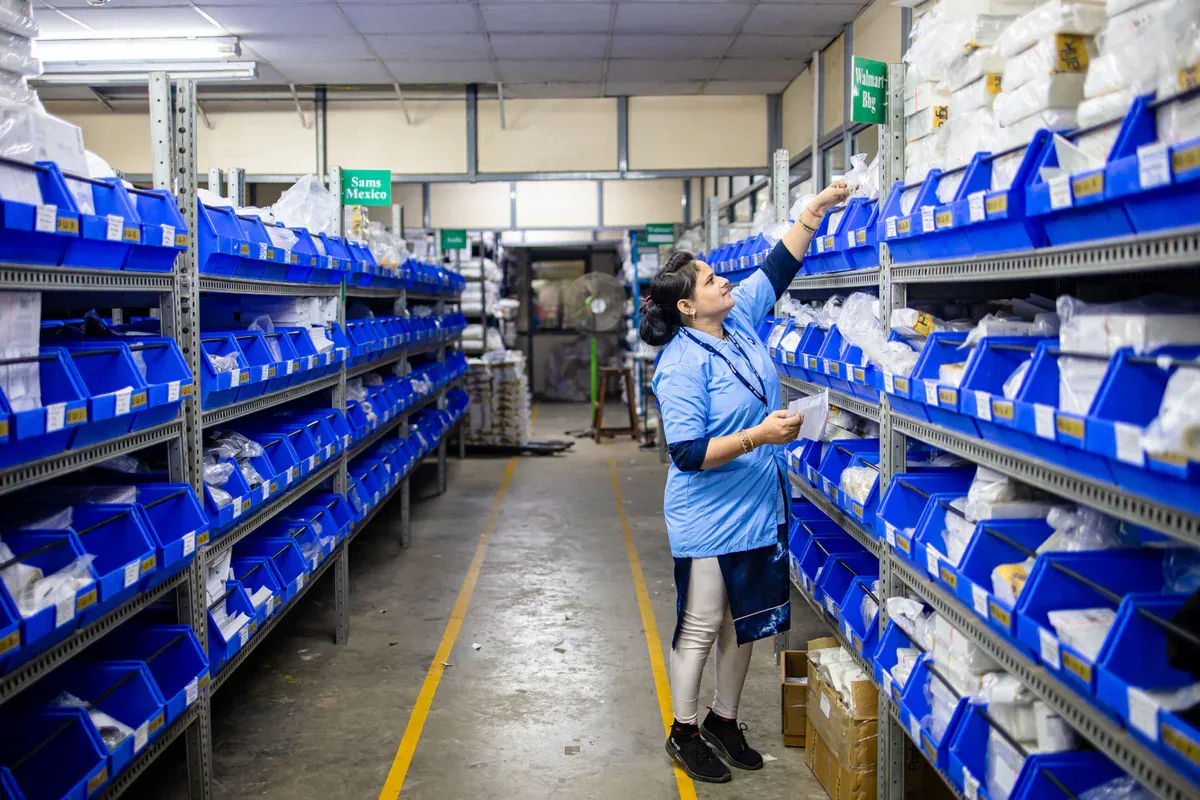 Electronic component inventory organized across warehouse shelves