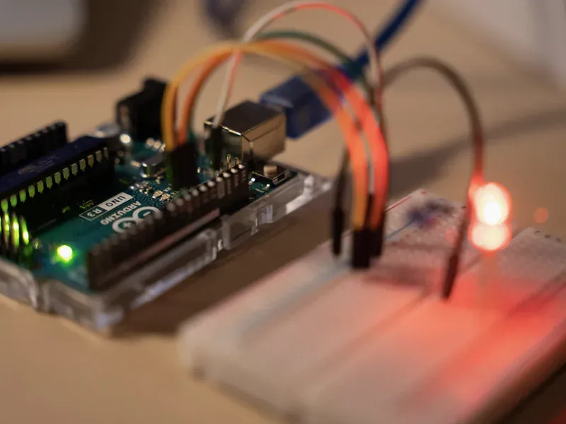 Resistors and jumper wires installed on a prototype board