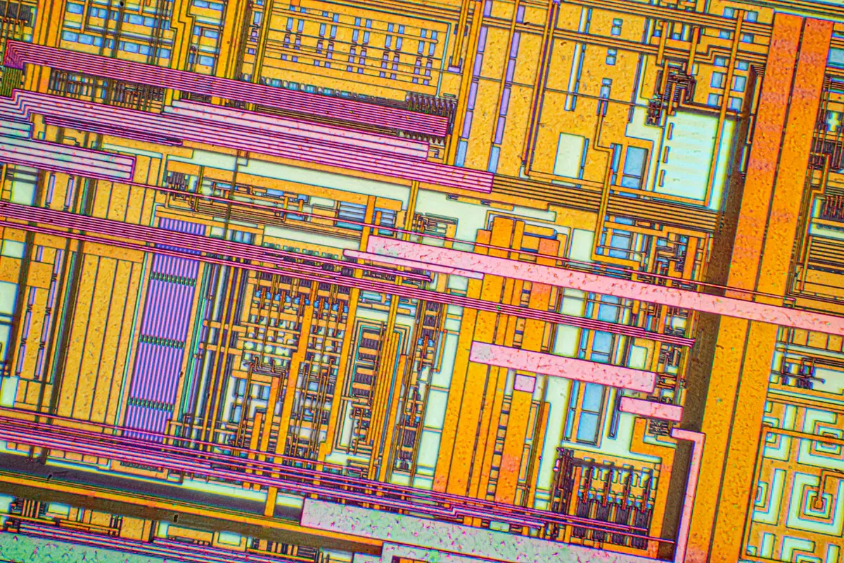 Silicon integrated circuit inspected under a microscope