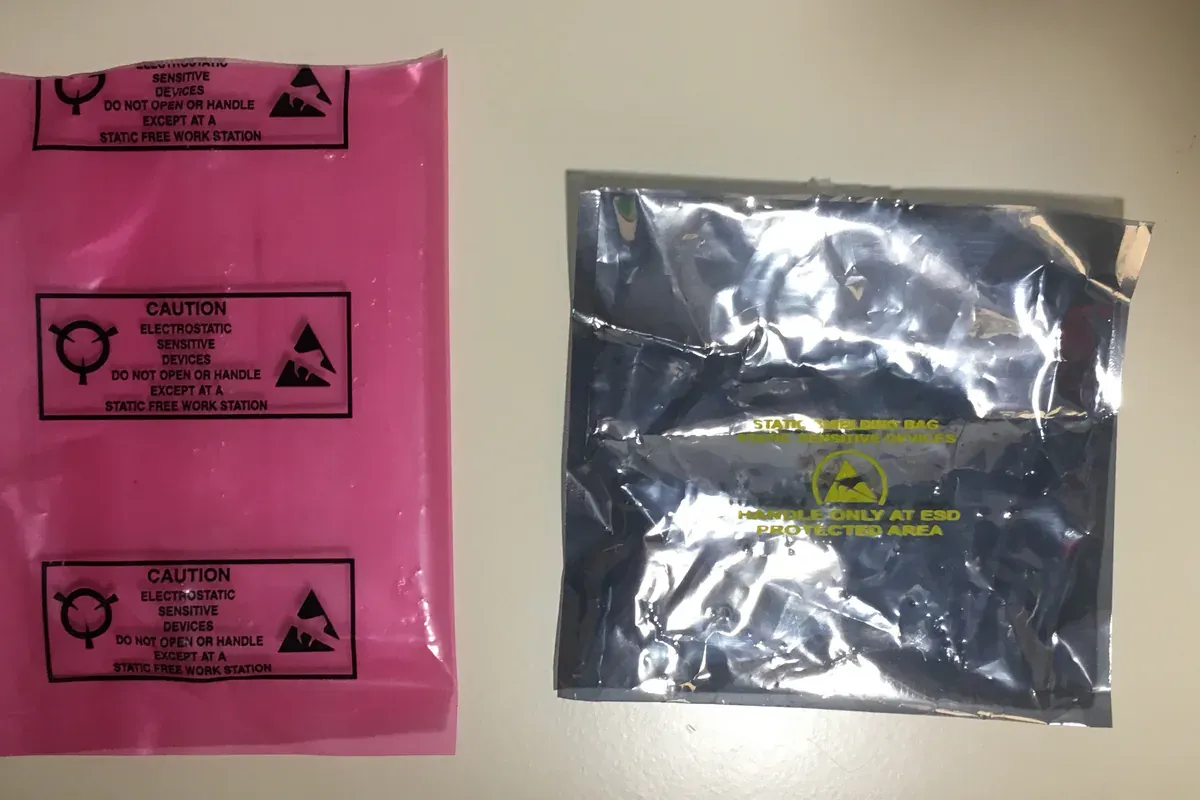ESD-safe receiving station with labeled electronic component packaging