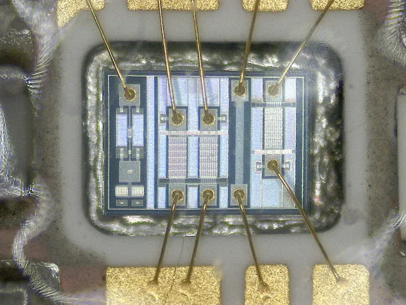 Circuit board inspection under a microscope during exact-grade hardware validation