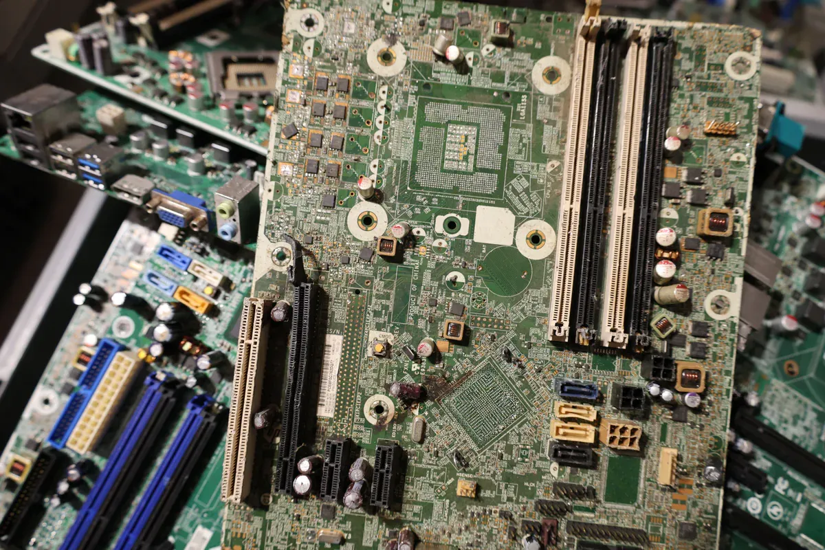 Old circuit boards sorted for responsible electronics recycling