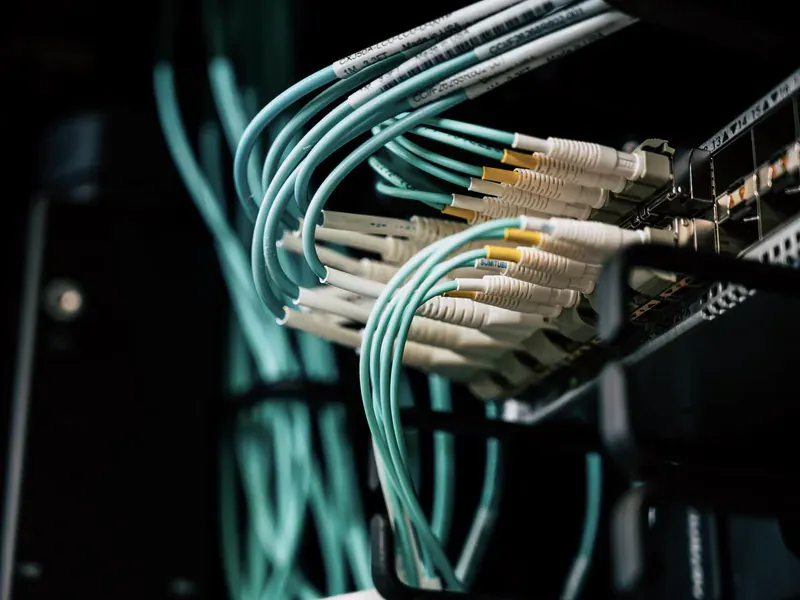 Fiber-optic network switching infrastructure illustrating the role of CPO in AI data centers
