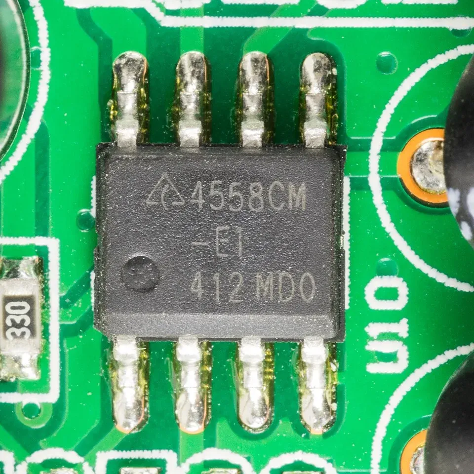 Dual operational amplifier and nearby circuit components