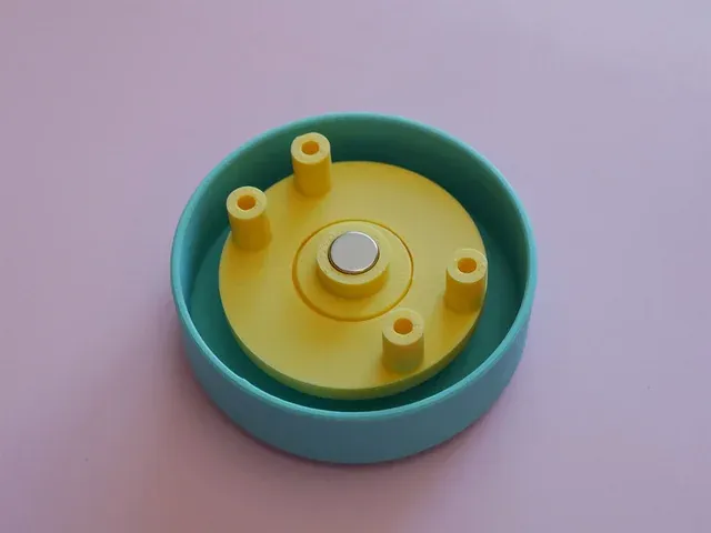 A magnet fitted into a rotary bearing assembly above the sensor position