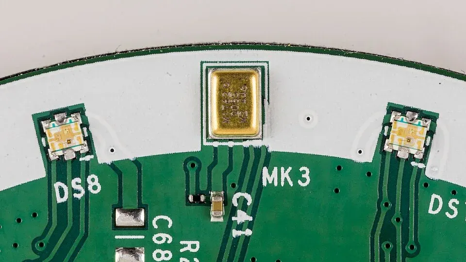 MEMS microphone package and acoustic port on a circuit board
