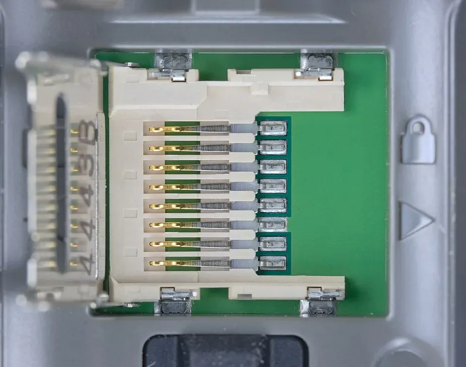 Open microSD card socket showing its electrical contacts