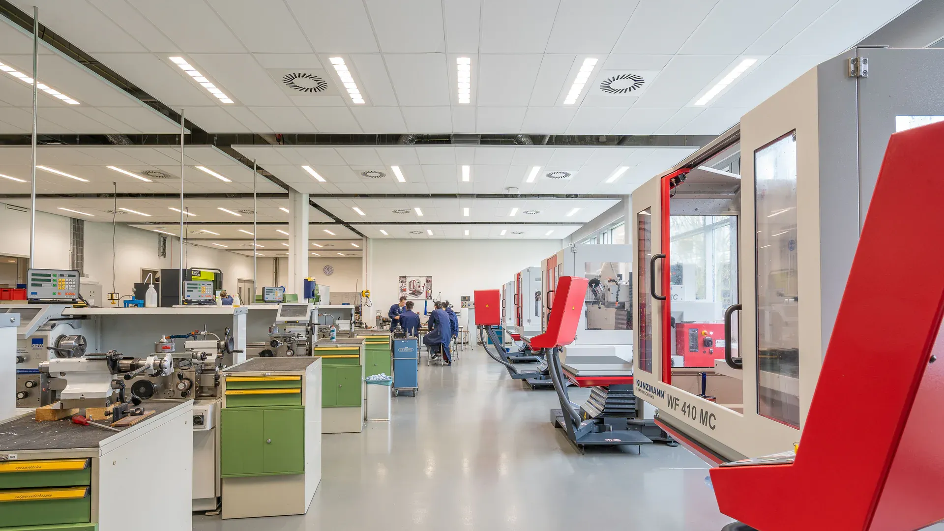 Modern industrial automation equipment on a clean factory production floor