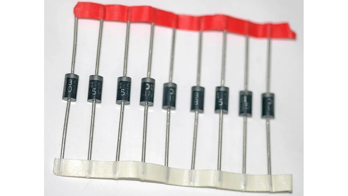 Axial diodes with leads secured between two strips of carrier tape