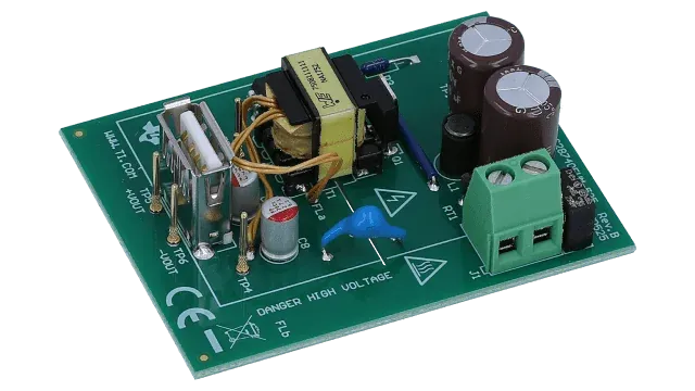 UCC28740EVM-525 flyback converter board with transformer and surrounding circuitry