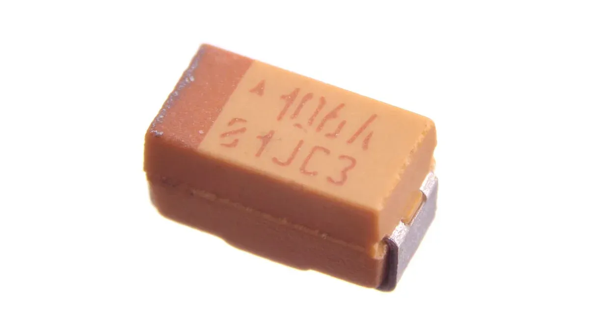 Surface-mount tantalum capacitor with a polarity band and marked value