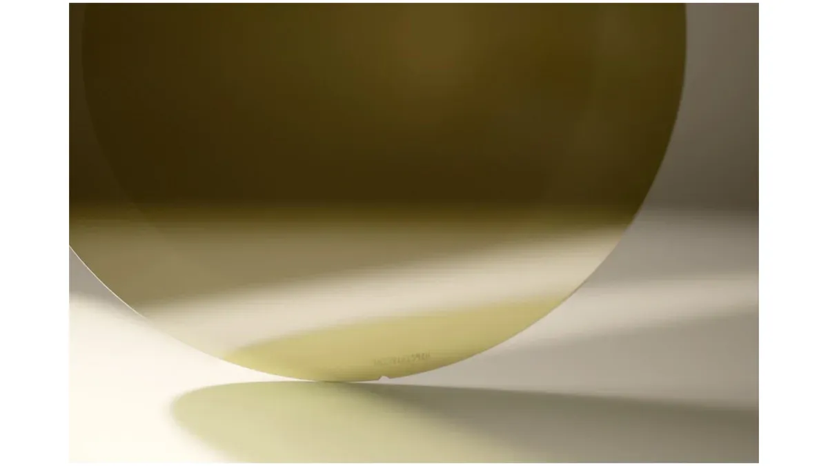 Silicon carbide wafer with a polished surface and orientation notch