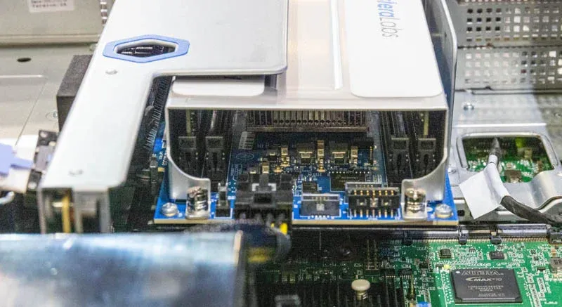 CXL memory expansion board installed on a riser inside a server