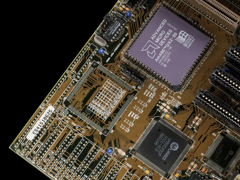 Timing components on a circuit board illustrating quartz and Si-MEMS oscillator choices